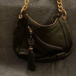 NWOT Michael Kors- No stains anywhere. Clean inside - used 1x